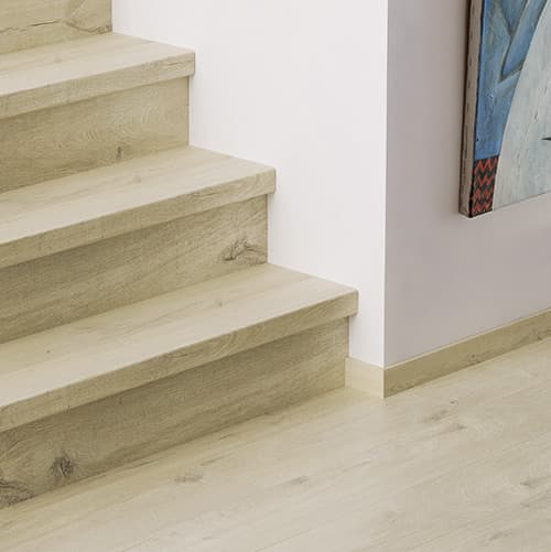 beige vinyl stair covers matching with the vinyl floor